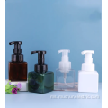 Pembuangan sabun cecair berbuih dengan botol mencuci muka